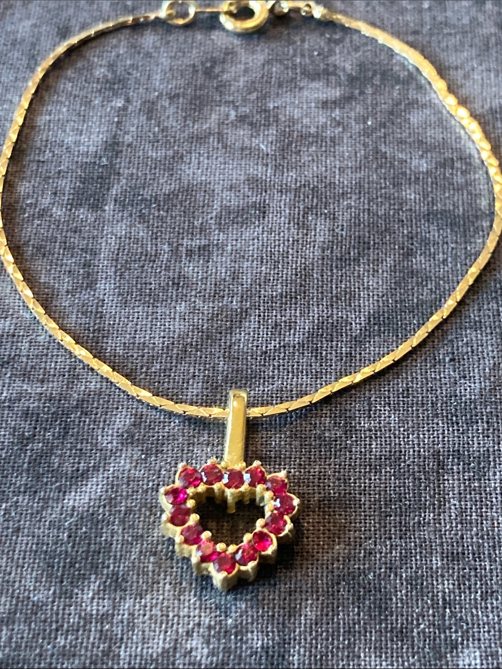 Gold Tone Heart Charm Bracelet with Red Rhinestones